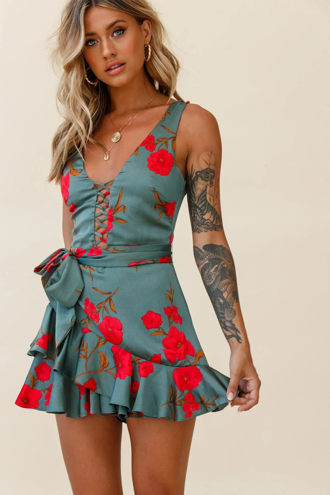 Wishful Thinking Plunging Neckline Ruffle Hem Romper Floral Print Sage